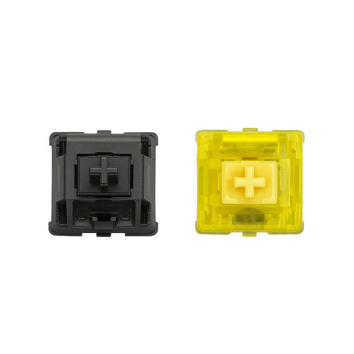 Close-up photo of Gateron Ink V2 Black and Yellow switches on a white background, showing detailed housing and stem structure without branding or text
