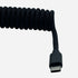 USB-C to USB-A coiled keyboard cable close-up