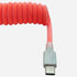 USB-C to USB-A premium pink coiled keyboard cable close-up