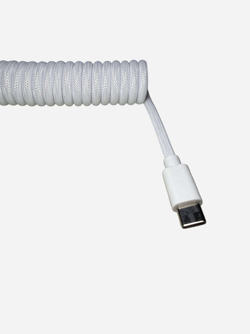 USB-C to USB-A white coiled keyboard cable close-up