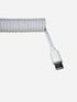 USB-C to USB-A white coiled keyboard cable close-up
