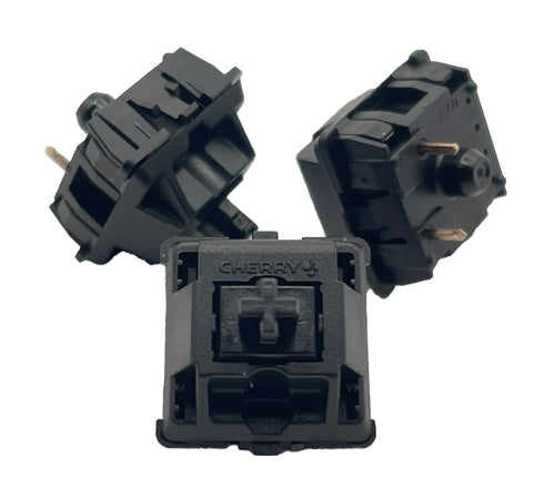 Drie Cherry MX1A Black switches met zwarte stem en behuizing – ideaal voor stille en lineaire toetsaanslag