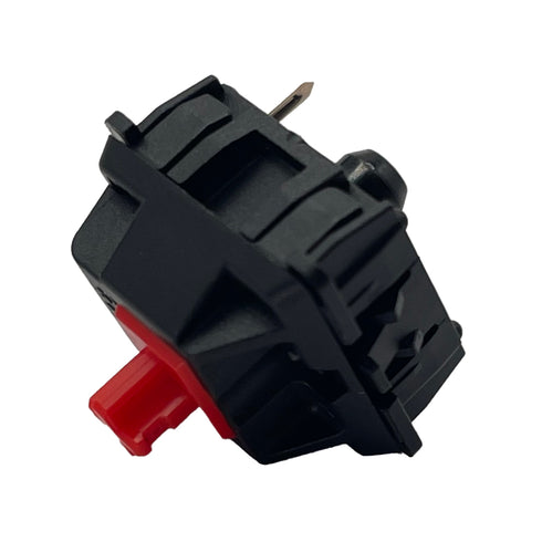 Zijaanzicht van Cherry MX1A Red switch met zichtbare rode stem en robuuste zwarte behuizing