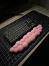 Dark pink cloud wrist rest for comfortable typing