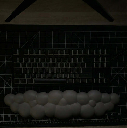 Cloud shaped grey wrist rest for keyboard desk setup