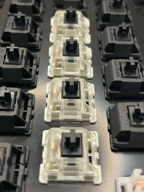Closeup of Gateron KS-9 Black switches mounted in keyboard housing