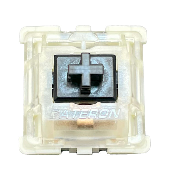 Gateron KS-9 Black mechanical switch top view showing black stem and translucent housing