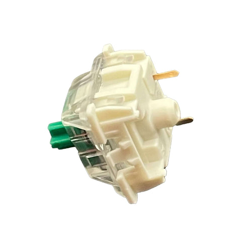 Zijaanzicht van de Gateron KS-9 Green switch met zichtbare metalen pinnen en groene stem.