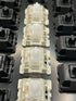 Top-down view of multiple Gateron KS-9 White switches installed in a keyboard plate among other switch types.