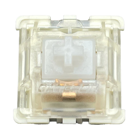 Close-up top view of the Gateron KS-9 White mechanical switch showing its translucent housing and white stem.