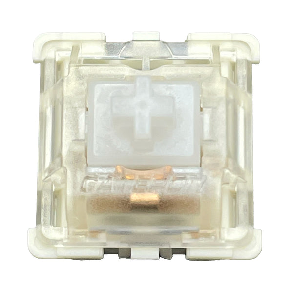 Close-up top view of the Gateron KS-9 White mechanical switch showing its translucent housing and white stem.