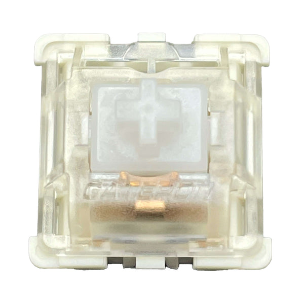 Close-up top view of the Gateron KS-9 White mechanical switch showing its translucent housing and white stem.