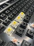 Gateron KS-9 Yellow switches op een toetsenbord, onder hoek gefotografeerd
