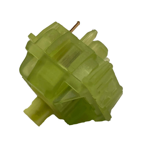 Schuine zijaanzicht van de Gateron Luciola switch – lichtgroene behuizing met glow-in-the-dark effect