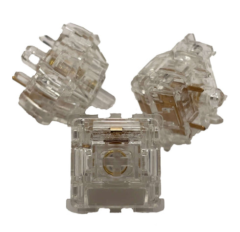 Drie Gateron North Pole Yellow 2.0 switches met transparante behuizing en gele componenten – lineair mechanisch toetsenbord switch