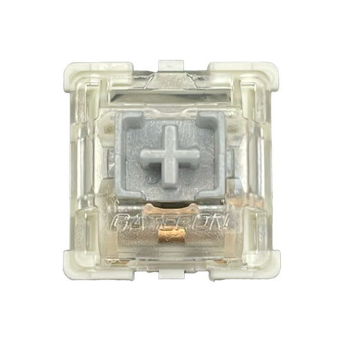 Close-up front view of the Gateron SMD Silver Pro switch showing the light grey stem and transparent housing.