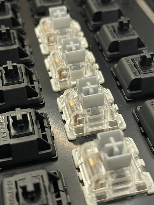 Angled overview of a keyboard featuring Gateron SMD Silver Pro switches in a highlighted section.