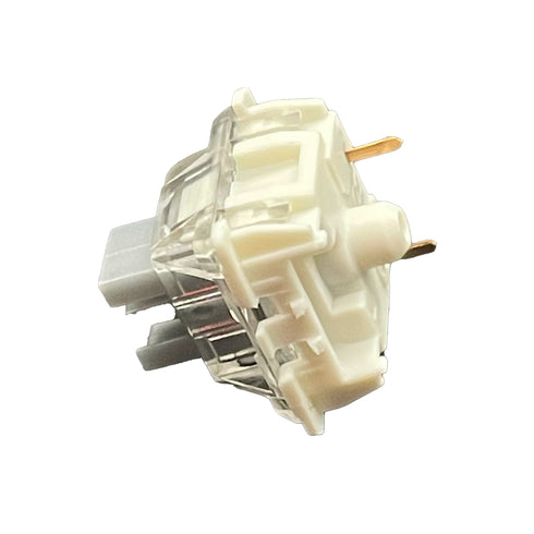 Angled side view of the Gateron SMD Silver Pro switch displaying its light grey stem and milky bottom housing.