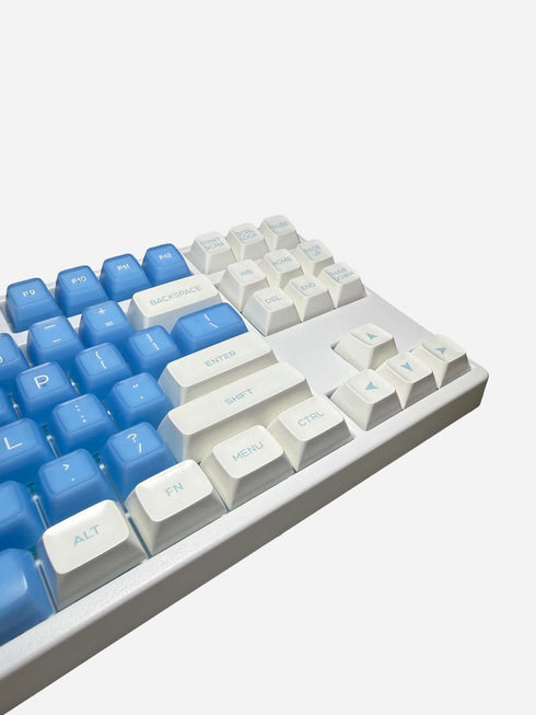 Ice Blue blue and white keycaps installed on keyboard