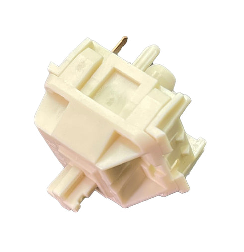 Kailh Cream mechanische switch vanuit schuine hoek met herkenbare crèmekleurige afwerking