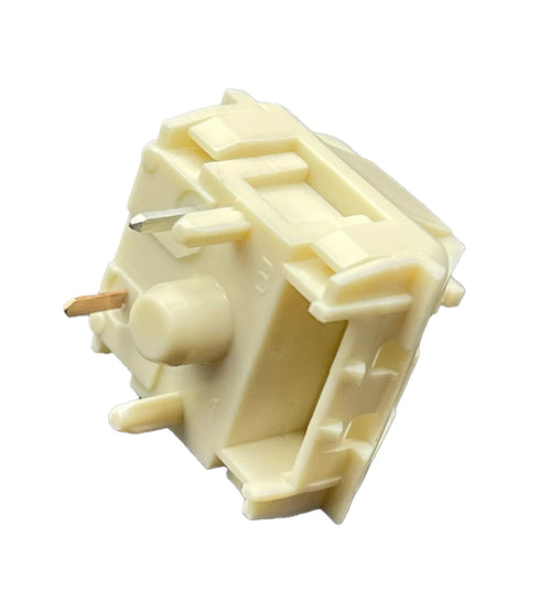 Schuin zijaanzicht van de Kailh Cream switch met zichtbare aansluitpinnen en massieve bouw