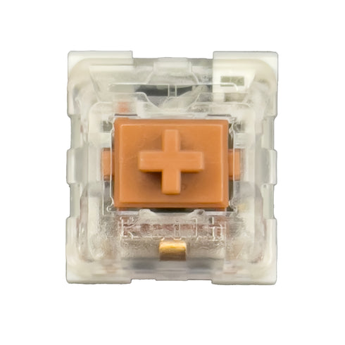 Kailh Speed Bronze switch – bovenaanzicht met transparante bovenkant en koperkleurige stem