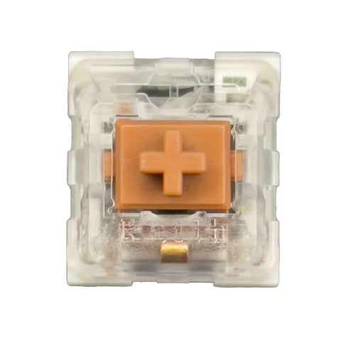 Kailh Speed Bronze switch – bovenaanzicht met transparante bovenkant en koperkleurige stem