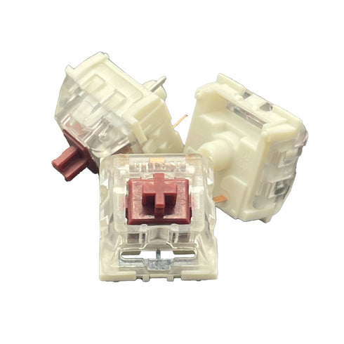 Drie Kailh Speed Coppery switches bij elkaar, ideaal voor mechanische toetsenborden.