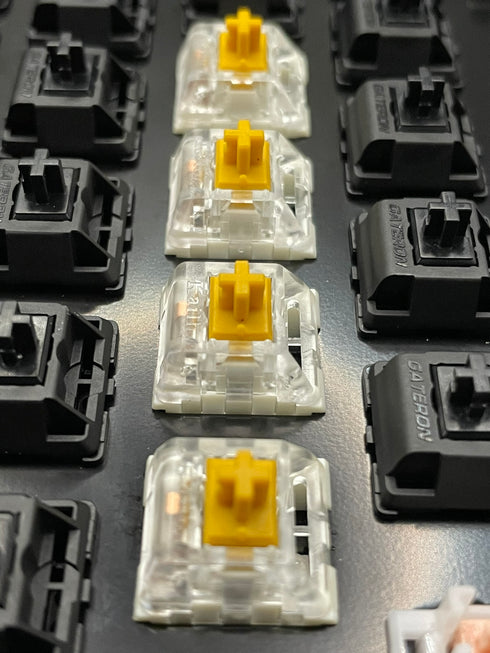 Kailh Speed Golden switches installed on a mechanical keyboard, viewed from the top side.
