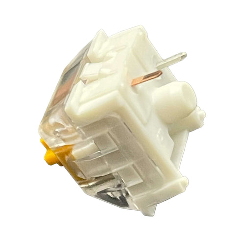 Angled side view of the Kailh Speed Golden switch showcasing the yellow stem and white housing.