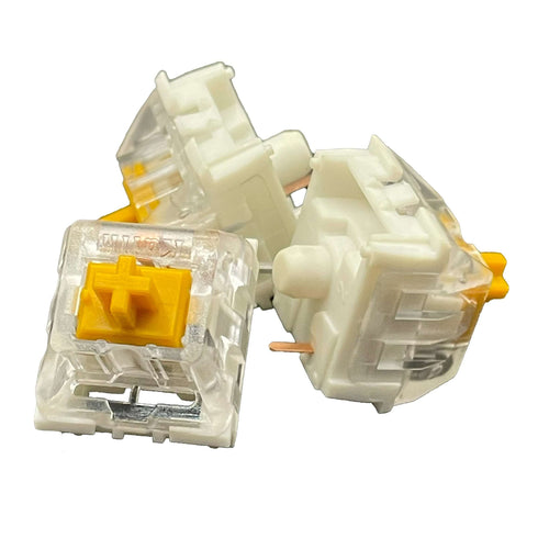 Three Kailh Speed Golden switches positioned together to highlight different angles and housing clarity.