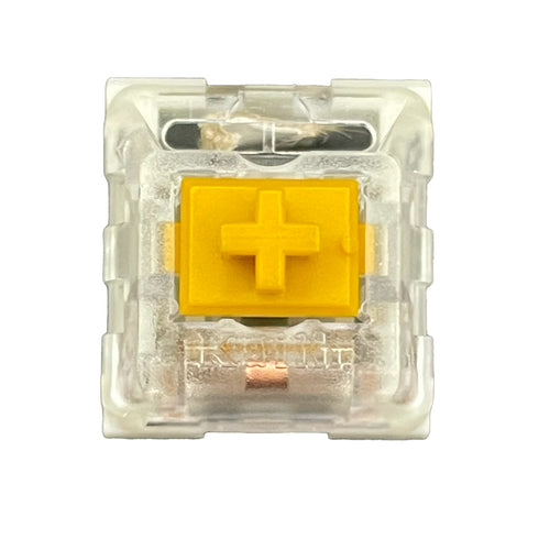 Top view of the Kailh Speed Golden switch featuring a yellow stem and transparent housing.