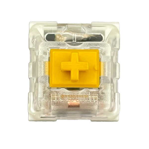 Top view of the Kailh Speed Golden switch featuring a yellow stem and transparent housing.