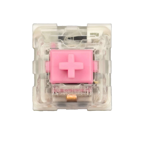 Top view of a Kailh Speed Pink mechanical switch showing the pink cross stem in a transparent housing.