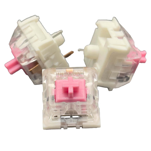 Three Kailh Speed Pink switches shown from different angles on a white background.