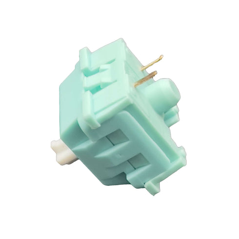 Schuin zijaanzicht van de KTT Mint switch – mintkleurige behuizing met witte stem